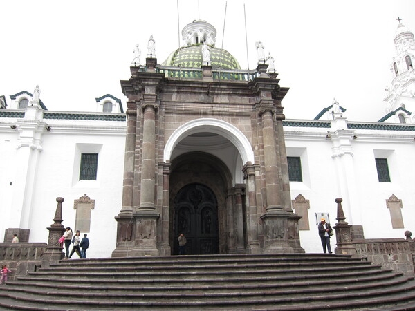 The Quito Metropolitan Cathedral in Ecuador was first built between 1535 and 1545 but was subsequently reconstructed and enhanced over the centuries. The photo shows the "Arch of Carondelet" entrance (built in 1797) and its staircase.