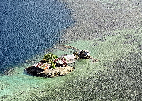 An isolated homestead off the island of Pohnpei in Micronesia. Photo courtesy of US Air Force/ Tech. Sgt. Tony Tolley.