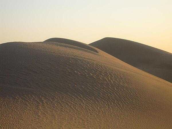 The sand dunes of the Sahara Desert in Libya.