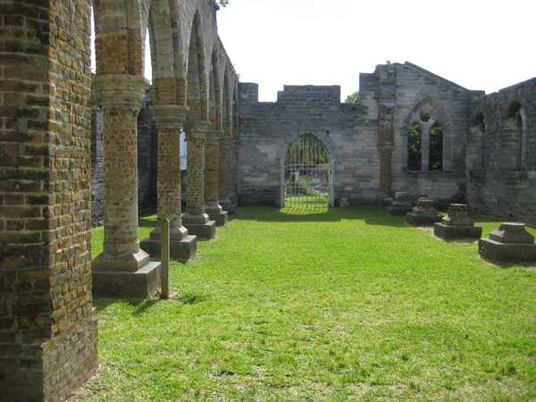 Bermuda’s “Unfinished Church,” pictured here, would have been St. George Church but fell victim to three events that precluded its use. The Gothic 650-seat church, designed by William Hay, began construction in 1874, but the congregation split, halting work. Funds were later diverted to build a new cathedral in Hamilton after the old one burned down. Private donations finished the church in 1899, but the reunited congregation chose to use an older building. In 1926, a storm damaged the church, leaving it in its present condition.