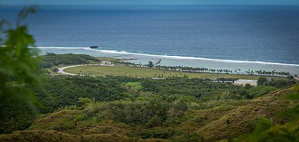 View from Asan Bay Overlook toward Guam's War in the Pacific National Historical Park. This photo is taken from the perspective of the Japanese defenders when US forces landed on 21 July 1944. Photo courtesy of the US National Park Service.