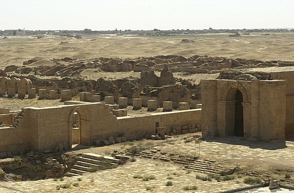 The remains of several temples and the ancient walls that surrounded them can be seen from the top of the highest temple in the center of the ancient city of Hatra, Iraq. Photo courtesy of the US Department of Defense.