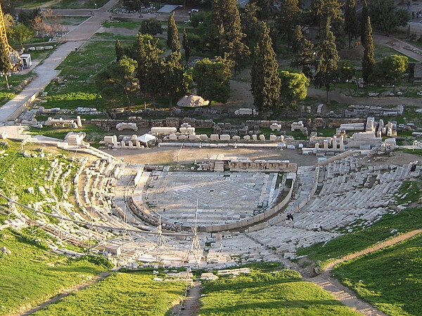 The first known plays were performed in the Theatre of Dionysus on the south side of the Acropolis in Athens, Greece, in the 4th century B.C.  The theater, which seats approximately 17,000 spectators, is considered the oldest in the world and is the prototype for Greek theaters. It fell into disuse and decay but was rediscovered in 1765, with restoration beginning in the late 1800s. The theater has been part of the Acropolis of Athens UNESCO World Heritage site since 1987.